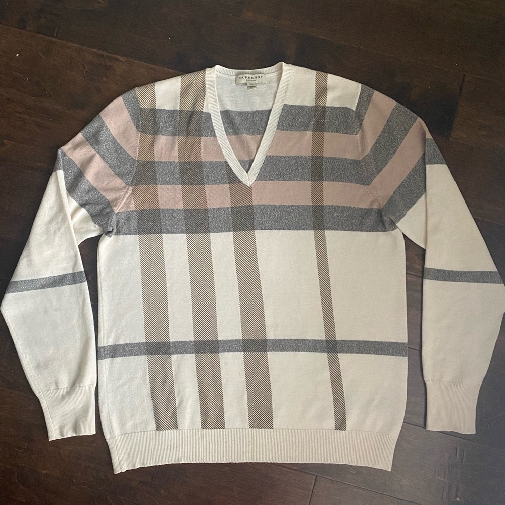 Burberry sweater with a signature check pattern. 74% wool, 14% cashmere.